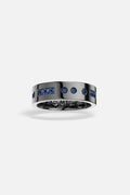 APM Ring in dark rhodium finish with deep blue stones, boldly modern.
