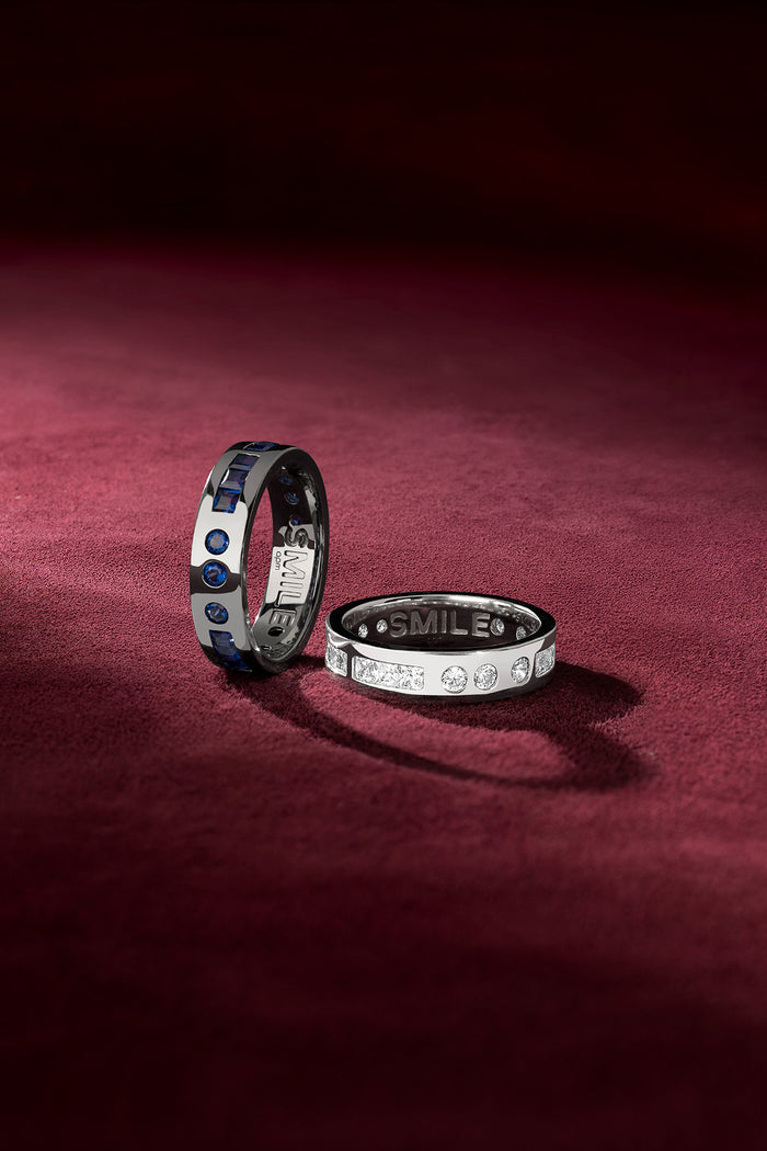 APM Smile Rings, a duet of blue and clear brilliance on velvet.