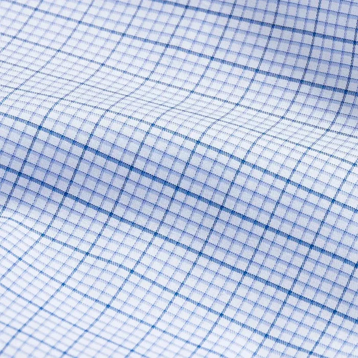 Kent micro-twill fabric close-up - blue windowpane check pattern texture