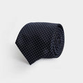 Navy Basso 100% silk jacquard tie with small-scale white dots — made in Italy by Ledbury