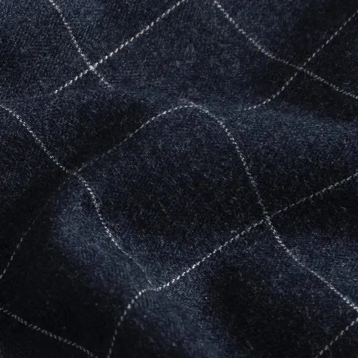 Brushed twill fabric close-up - navy windowpane check pattern texture