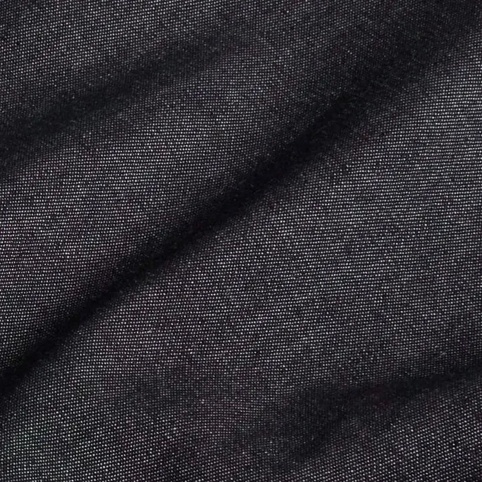 Washed black Slater denim fabric close-up - 100% cotton texture