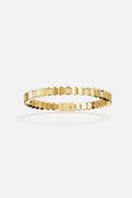 APM bracelet in golden hues, faceted geometry meets modern edge.