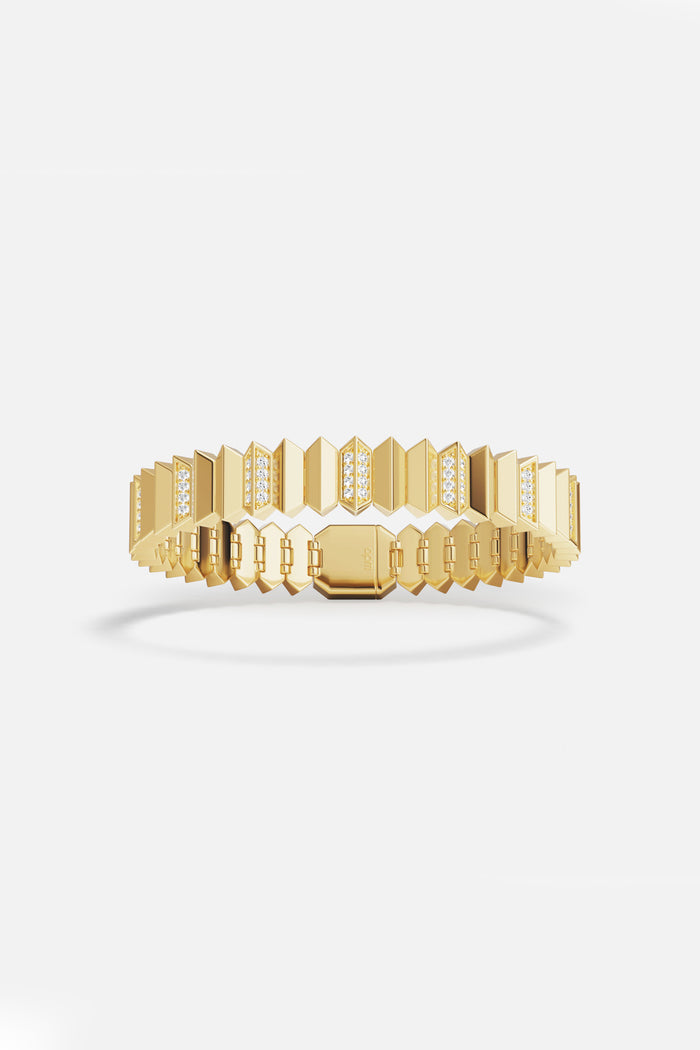 APM Bracelet in golden color, sculpted edges and quiet brilliance for modern allure.